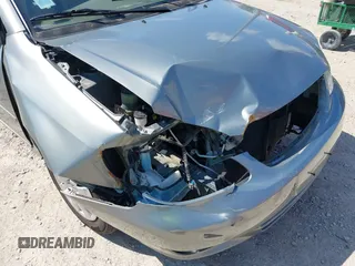 2004 Toyota Corolla CE with VIN 1NXBR32EX4Z336158, listed as a IAAI auction lot 42180440 with 67,820 mi miles and . Bid and sale history available at DreamBid. Image 6.