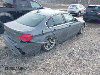 2017 BMW 3 Series 330i xDrive with VIN WBA8D9G30HNU65630, listed as a IAAI auction lot 41654369 with 150,962 mi miles. Bid and sale history available at carsss.com. Image 4.