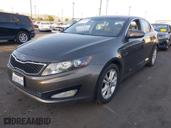 2011 Kia Optima EX with VIN KNAGN4A68B5086204, listed as a IAAI auction lot 41976276 with 177,439 mi miles and . Bid and sale history available at carsss.com. Image 2.