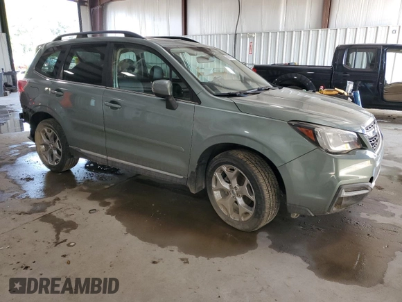 2017 Subaru Forester Touring with VIN JF2SJAWC5HH572306, listed as a Copart auction lot 63699995 with Not provided miles and Salvage title. Bid and sale history available at DreamBid. Image 4.