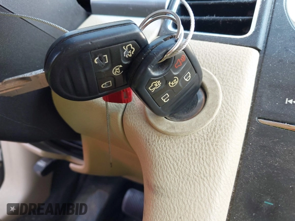 2014 Ford Taurus SEL with VIN 1FAHP2E84EG141795, listed as a IAAI auction lot 42133668 with 154,009 mi miles and . Bid and sale history available at DreamBid. Image 11.