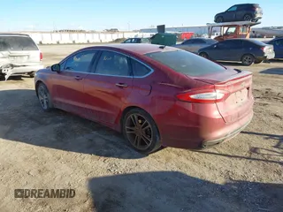 2014 Ford Fusion Titanium with VIN 3FA6P0K99ER241148, listed as a IAAI auction lot 41410796 with 217,003 mi miles. Bid and sale history available at carsss.com. Image 3.