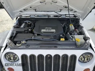 2013 Jeep Wrangler Unlimited Sport with VIN 1C4BJWDG8DL639781, listed as a Copart auction lot 63620025 with 84,720 mi miles and Salvage title. Bid and sale history available at DreamBid. Image 11.