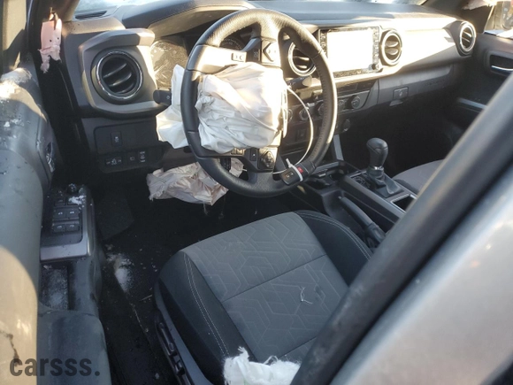 2023 Toyota Tacoma 4WD SR with VIN 3TMCZ5AN8PM638790, listed as a Copart auction lot 85665004 with 0 mi miles and Salvage Title. Bid and sale history available at carsss.com. Image 8.
