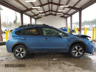 2014 Subaru Crosstrek Touring z VIN JF2GPBKC2EH314627, wystawiony jako IAAI lot #41598486 z przebiegiem 72 669 mil mil oraz . Historia ofert i sprzedaży dostępna na DreamBid. Obrazek 14.