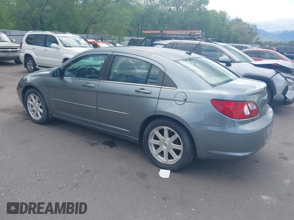 2007 Chrysler Sebring Touring z VIN 1C3LC56R17N521091, wystawiony jako IAAI lot #42202185 z przebiegiem 128 726 mil mil oraz . Historia ofert i sprzedaży dostępna na DreamBid. Obrazek 3.