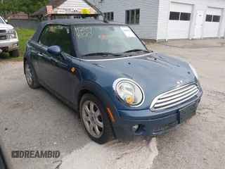 2009 MINI Convertible z VIN WMWMR33559TU96647, wystawiony jako IAAI lot #42498100 z przebiegiem 65 194 mil mil oraz . Historia ofert i sprzedaży dostępna na DreamBid. Obrazek 1.