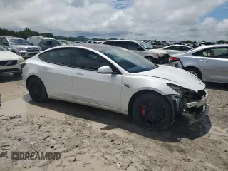 2018 Tesla Model 3 Long Range Battery z VIN 5YJ3E1EB7JF106429, wystawiony jako Copart lot #56319995 z przebiegiem 145 648 mil mil oraz Tytuł czysty. Historia ofert i sprzedaży dostępna na DreamBid. Obrazek 4.