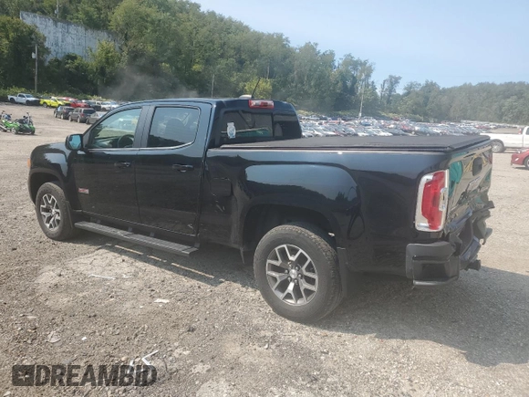 2018 GMC Canyon 4WD All Terrain w/Cloth with VIN 1GTG6CEN0J1301365, listed as a Copart auction lot 69886294 with 61,857 mi miles and Salvage Title. Bid and sale history available at carsss.com. Image 2.