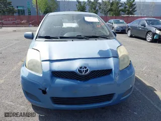 2010 Toyota Yaris with VIN JTDJT4K31A5314450, listed as a IAAI auction lot 41827488 with 212,976 mi miles. Bid and sale history available at carsss.com. Image 6.