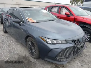 2021 Toyota Avalon Hybrid XSE z VIN 4T1EA1AB2MU001301, wystawiony jako IAAI lot #41870872 z przebiegiem 49 962 mil mil oraz . Historia ofert i sprzedaży dostępna na DreamBid. Obrazek 1.
