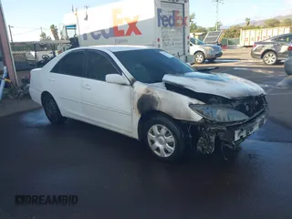 2002 Toyota Camry LE z VIN JTDBE32K120093737, wystawiony jako IAAI lot #41214245 z przebiegiem Nie podano mil oraz . Historia ofert i sprzedaży dostępna na DreamBid. Obrazek 1.