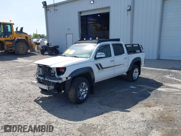 2013 Toyota Tacoma with VIN 3TMLU4EN9DM113137, listed as a IAAI auction lot 41709140 with 57,704 mi miles and . Bid and sale history available at DreamBid. Image 18.