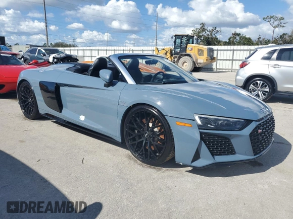 2020 Audi R8 z VIN WUAVECFX5L7901778, wystawiony jako Copart lot #74736714 z przebiegiem Nie podano mil oraz Nie do naprawy • Non repairable. Historia ofert i sprzedaży dostępna na DreamBid. Obrazek 4.