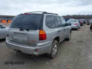 2008 GMC Envoy SLE2 with VIN 1GKDS13S982225326, listed as a IAAI auction lot 42046634 with 165,482 mi miles and . Bid and sale history available at DreamBid. Image 4.