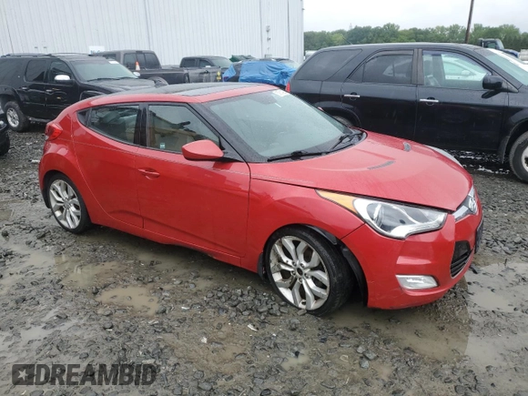2013 Hyundai Veloster w/Gray Int z VIN KMHTC6AD0DU147454, wystawiony jako Copart lot #57814285 z przebiegiem 91 000 mil mil oraz Szkoda całkowita • Salvage title. Historia ofert i sprzedaży dostępna na DreamBid. Obrazek 4.