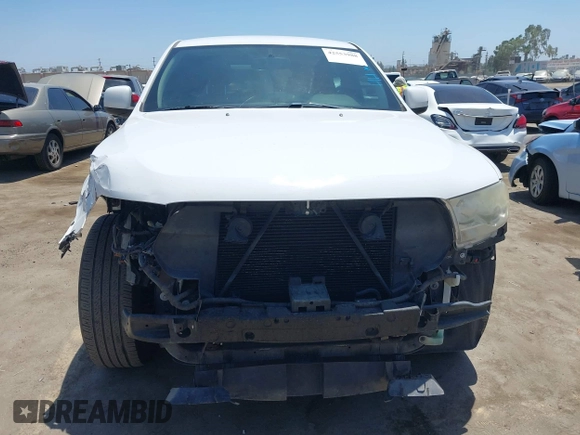 2013 Dodge Durango SXT with VIN 1C4RDHAG9DC678353, listed as a IAAI auction lot 42553988 with 174,042 mi miles and . Bid and sale history available at DreamBid. Image 13.