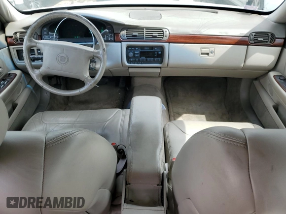 1999 Cadillac DeVille z VIN 1G6KD54Y7XU801251, wystawiony jako Copart lot #52819854 z przebiegiem 180 871 mil mil oraz Szkoda całkowita • Salvage title. Historia ofert i sprzedaży dostępna na DreamBid. Obrazek 8.