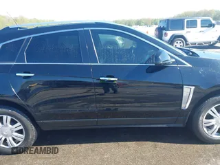 2013 Cadillac SRX Luxury Collection z VIN 3GYFNCE34DS584959, wystawiony jako IAAI lot #42080339 z przebiegiem 133 564 mil mil oraz . Historia ofert i sprzedaży dostępna na DreamBid. Obrazek 14.