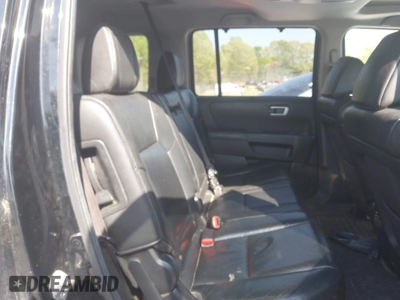 2012 Honda Pilot Touring with VIN 5FNYF4H95CB026191, listed as a IAAI auction lot 42021987 with 229,273 mi miles and . Bid and sale history available at DreamBid. Image 8.