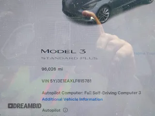 2020 Tesla Model 3 Standard Range Plus with VIN 5YJ3E1EAXLF615781, listed as a IAAI auction lot 42068935 with 96,026 mi miles. Bid and sale history available at carsss.com. Image 7.
