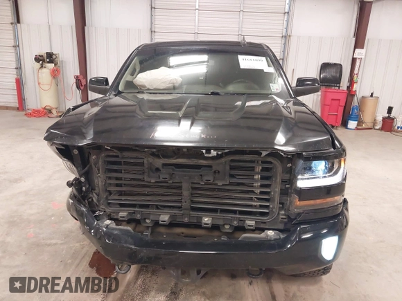 2017 Chevrolet Silverado 1500 LT with VIN 3GCUKREC6HG501307, listed as a IAAI auction lot 41611899 with 133,863 mi miles and . Bid and sale history available at DreamBid. Image 10.