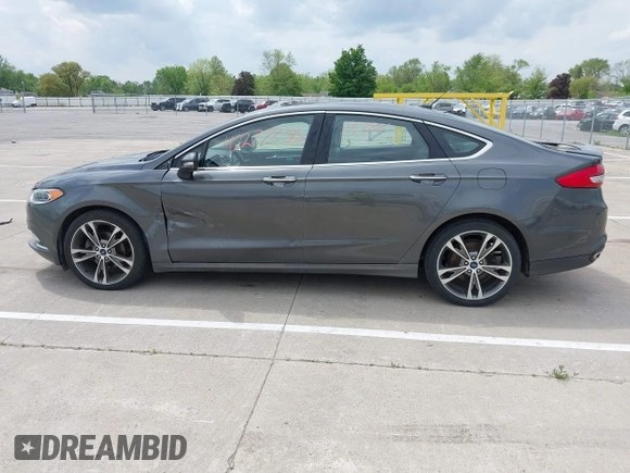 2017 Ford Fusion Titanium with VIN 3FA6P0D93HR261526, listed as a IAAI auction lot 42277350 with 117,388 mi miles and . Bid and sale history available at DreamBid. Image 14.