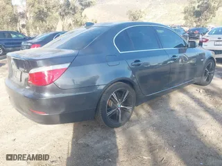 2008 BMW 5 Series 535xi with VIN WBANV935X8CZ63661, listed as a IAAI auction lot 41698806 with 156,212 mi miles. Bid and sale history available at carsss.com. Image 4.