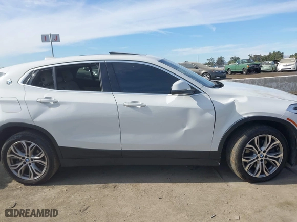 2020 BMW X2 sDrive28i with VIN WBXYH9C01L5P15004, listed as a IAAI auction lot 41128060 with 86,052 mi miles. Bid and sale history available at carsss.com. Image 12.