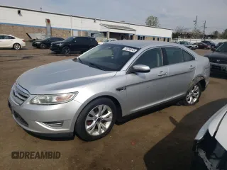 2012 Ford Taurus SEL z VIN 1FAHP2HW4CG129105, wystawiony jako Copart lot #54708445 z przebiegiem 201 450 mil mil oraz Szkoda całkowita • Salvage title. Historia ofert i sprzedaży dostępna na DreamBid. Obrazek 1.