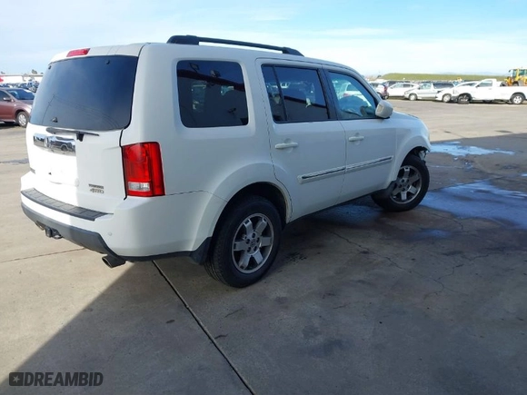 2010 Honda Pilot Touring with VIN 5FNYF4H85AB038734, listed as a IAAI auction lot 39101387 with 1 mi miles. Bid and sale history available at carsss.com. Image 4.