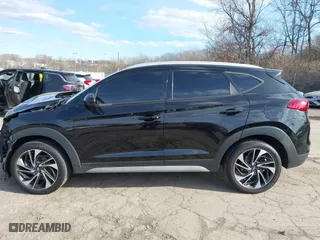 2021 Hyundai Tucson Sport with VIN KM8J3CAL6MU411855, listed as a IAAI auction lot 41694634 with 67,779 mi miles. Bid and sale history available at carsss.com. Image 15.