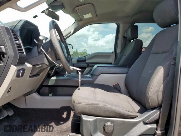 2020 Ford F-150 XL with VIN 1FTEW1CP2LKE78545, listed as a Copart auction lot 59577415 with 110,876 mi miles and Salvage title. Bid and sale history available at DreamBid. Image 7.