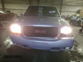 2000 GMC Denali z VIN 1GKEK13R9YR104210, wystawiony jako Copart lot #85599964 z przebiegiem 1 548 394 mil mil oraz Szkody całkowita. Historia ofert i sprzedaży dostępna na DreamBid. Obrazek 5.