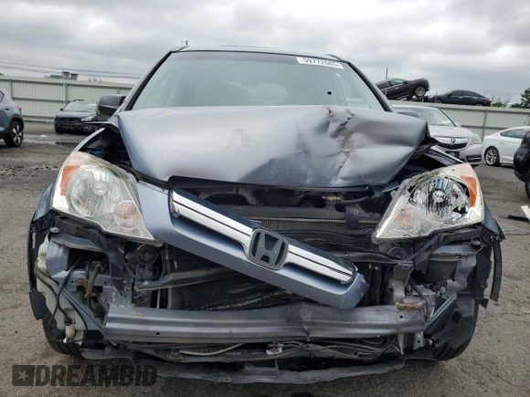 2007 Honda CR-V EX z VIN JHLRE48507C054572, wystawiony jako Copart lot #59772665 z przebiegiem 254 212 mil mil oraz Szkoda całkowita • Salvage title. Historia ofert i sprzedaży dostępna na DreamBid. Obrazek 5.