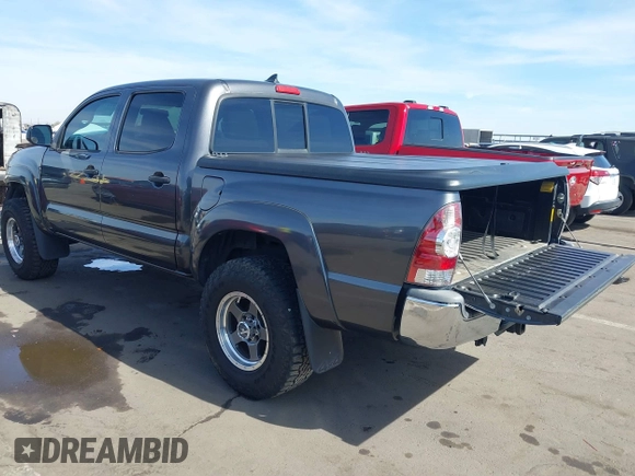 2014 Toyota Tacoma with VIN 3TMLU4EN0EM145573, listed as a IAAI auction lot 41621189 with 178,281 mi miles. Bid and sale history available at carsss.com. Image 3.