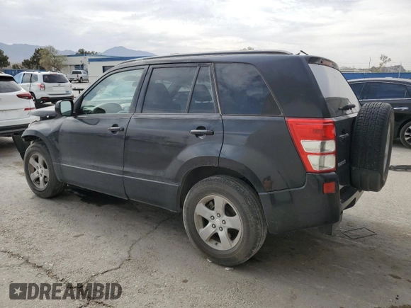 2009 Suzuki Grand Vitara with VIN JS3TE044094100649, listed as a Copart auction lot 52033855 with 137,460 mi miles and Salvage title. Bid and sale history available at DreamBid. Image 2.