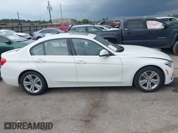 2017 BMW 3 Series 330i with VIN WBA8B9G56HNU09120, listed as a IAAI auction lot 42396399 with 55,667 mi miles and . Bid and sale history available at DreamBid. Image 13.