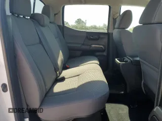 2023 Toyota Tacoma SR5 z VIN 3TMAZ5CN3PM212056, wystawiony jako Copart lot #57217735 z przebiegiem 36 533 mil mil oraz Szkoda całkowita • Salvage title. Historia ofert i sprzedaży dostępna na DreamBid. Obrazek 10.