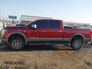 2017 Nissan Titan Pro-4X z VIN 1N6BA1F43HN562377, wystawiony jako IAAI lot #41786607 z przebiegiem 95 207 mil mil oraz . Historia ofert i sprzedaży dostępna na DreamBid. Obrazek 15.