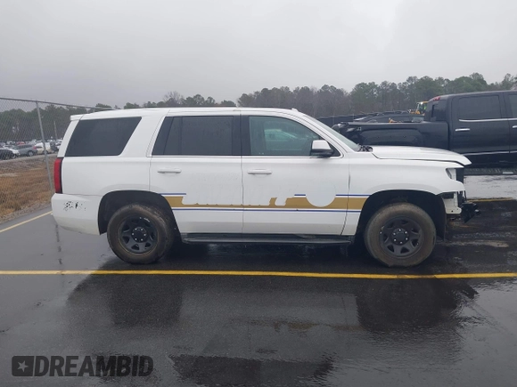 2019 Chevrolet Tahoe Commercial with VIN 1GNLCDEC4KR198330, listed as a IAAI auction lot 41542971 with 94,171 mi miles and . Bid and sale history available at DreamBid. Image 14.