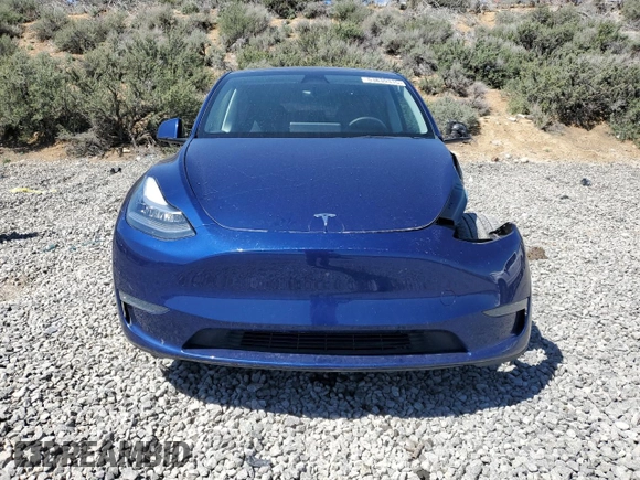 2023 Tesla Model Y Long Range with VIN 7SAYGDEE3PA106609, listed as a Copart auction lot 53839315 with 24,077 mi miles and Salvage Title. Bid and sale history available at DreamBid. Image 5.