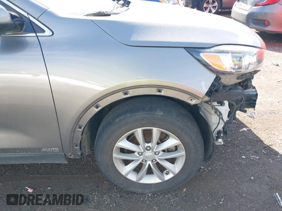 2016 Kia Sorento LX with VIN 5XYPGDA33GG136850, listed as a IAAI auction lot 42030317 with 120,798 mi miles and . Bid and sale history available at DreamBid. Image 17.