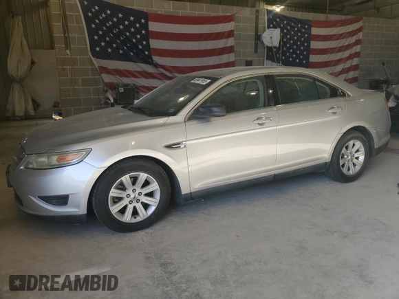 2011 Ford Taurus SE with VIN 1FAHP2DW6BG116196, listed as a Copart auction lot 52441955 with 201,487 mi miles and Salvage Title. Bid and sale history available at DreamBid. Image 1.