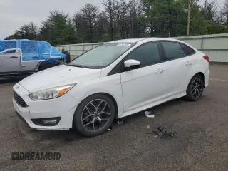 2016 Ford Focus SE with VIN 1FADP3F22GL221122, listed as a Copart auction lot 64247595 with 116,994 mi miles and Clean title. Bid and sale history available at DreamBid. Image 1.