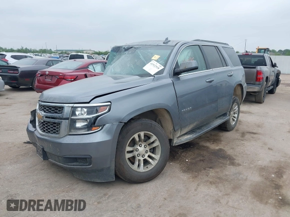 2020 Chevrolet Tahoe LS z VIN 1GNSCAKC3LR101733, wystawiony jako IAAI lot #41912918 z przebiegiem 153 731 mil mil oraz . Historia ofert i sprzedaży dostępna na DreamBid. Obrazek 2.