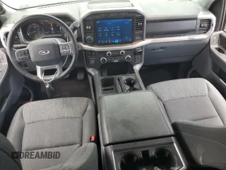 2021 Ford F-150 XL with VIN 1FTEW1CP2MKE62928, listed as a Copart auction lot 59882525 with 32,481 mi miles and Salvage title. Bid and sale history available at DreamBid. Image 8.