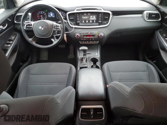 2019 Kia Sorento LX z VIN 5XYPG4A34KG534173, wystawiony jako Copart lot #57404535 z przebiegiem 112 688 mil mil oraz Szkoda całkowita • Salvage title. Historia ofert i sprzedaży dostępna na DreamBid. Obrazek 8.