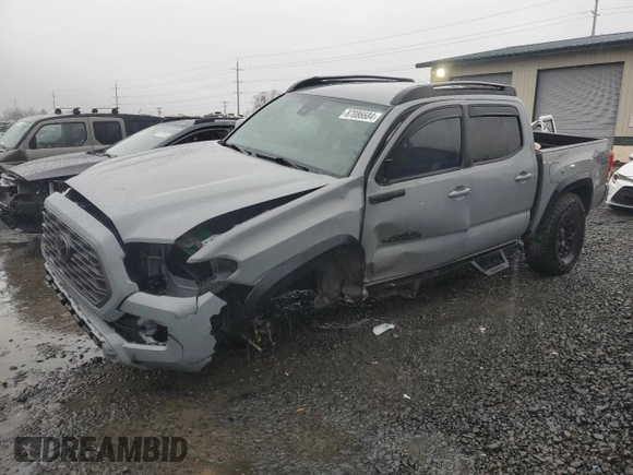 2021 Toyota Tacoma SR with VIN 3TMCZ5AN0MM395357, listed as a Copart auction lot 87086684 with 48,664 mi miles and Salvage title. Bid and sale history available at DreamBid. Image 1.