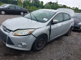 2012 Ford Focus SE with VIN 1FAHP3F29CL353872, listed as a IAAI auction lot 42528943 with Not provided miles and . Bid and sale history available at DreamBid. Image 2.